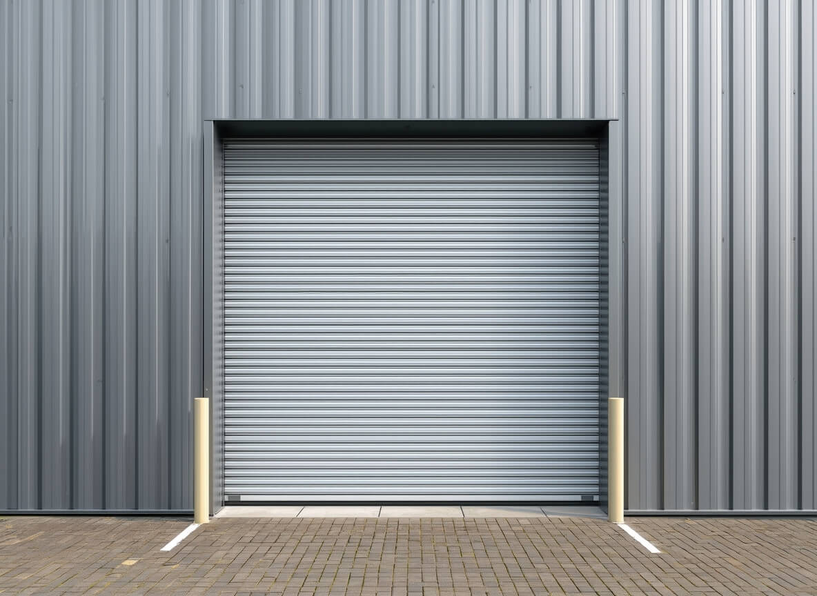 Residential Door Installation by Rapid Garage Door — Clean white garage door installation on suburban home in Cleveland, OH